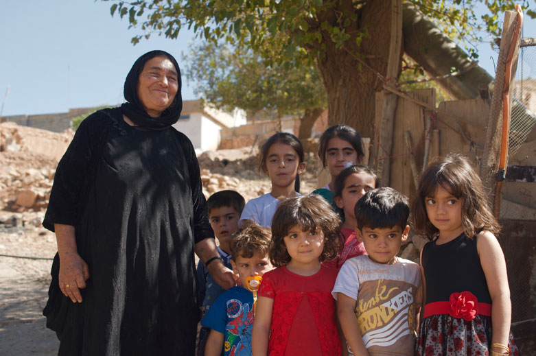 Kurdish woman and her family in Degala village, previously targeted by Saddam's regime. 